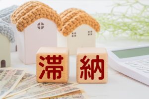 自己破産すると滞納している家賃はどうなる？賃貸物件に住み続けられる？